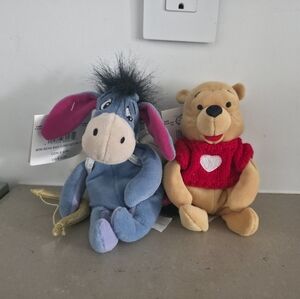 the disney store collectible plush winnie the pooh and eeyore